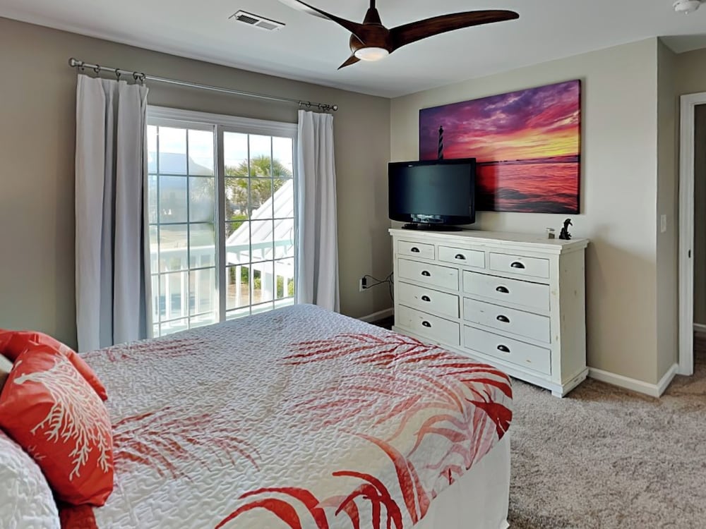 Blue Me A Wave by Topsail Realty