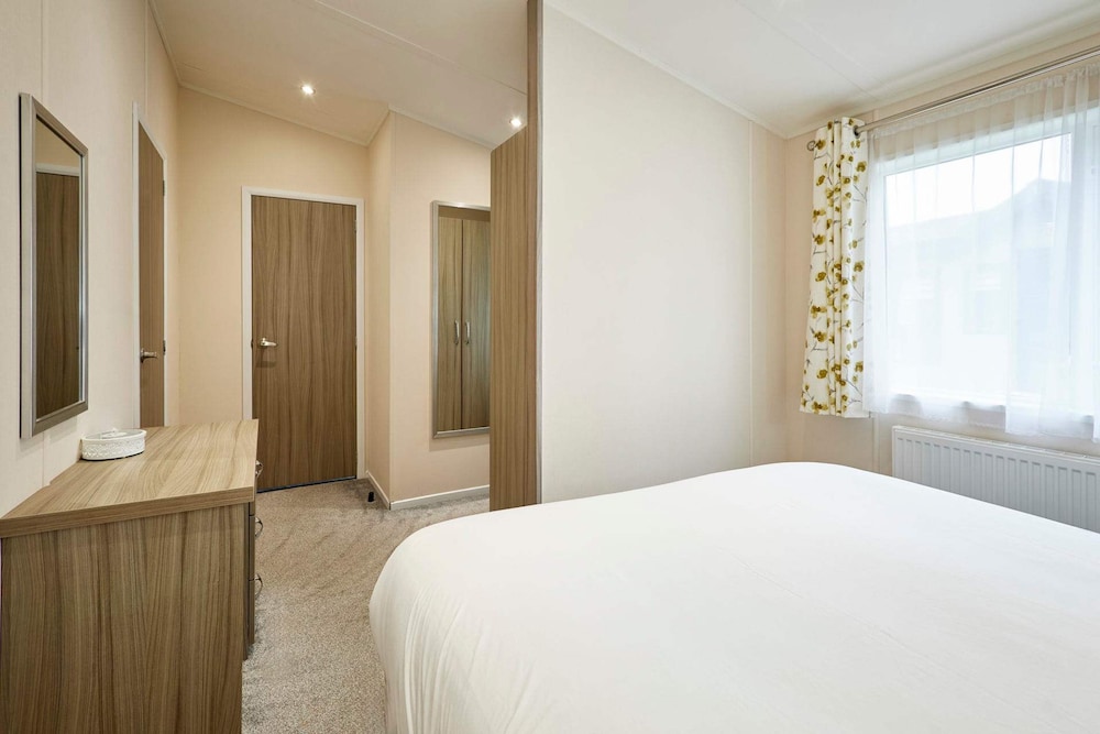 Host Stay Woodpecker Lodge