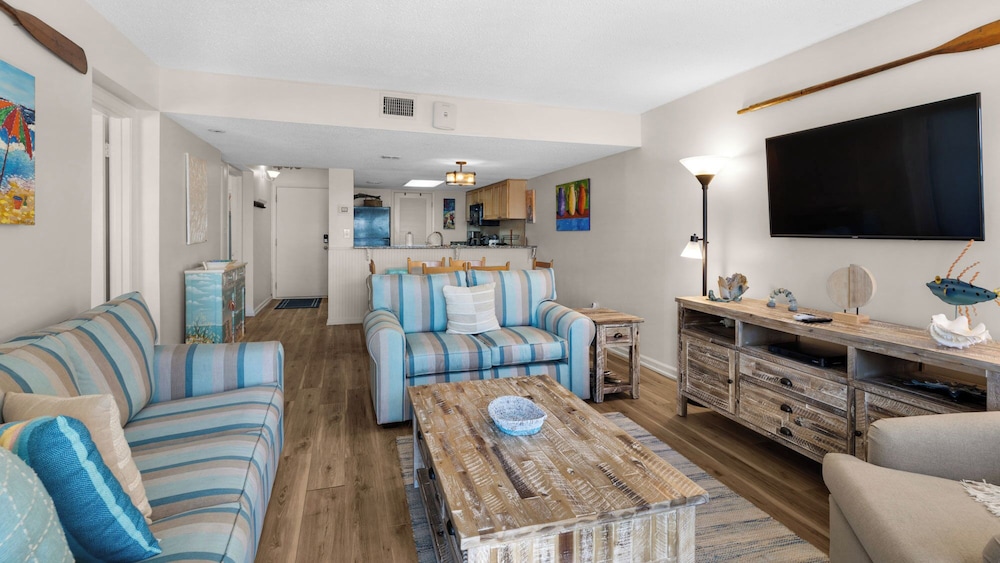 Beachfront Charm Meets Lake Life + Free Tickets: Dolphin Cruise & More!