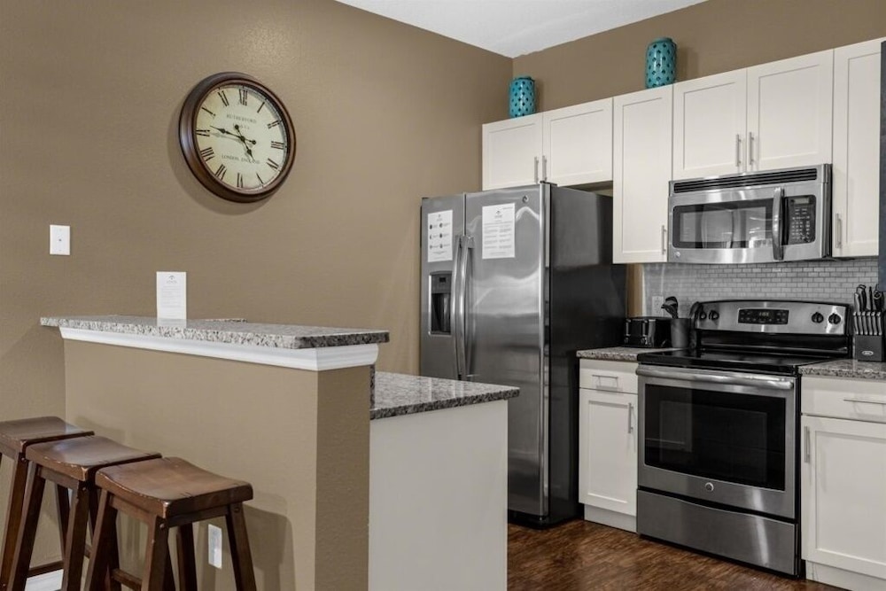 3 Bedrooms S / Lucaya Village Townhouse by RedAwning view 2