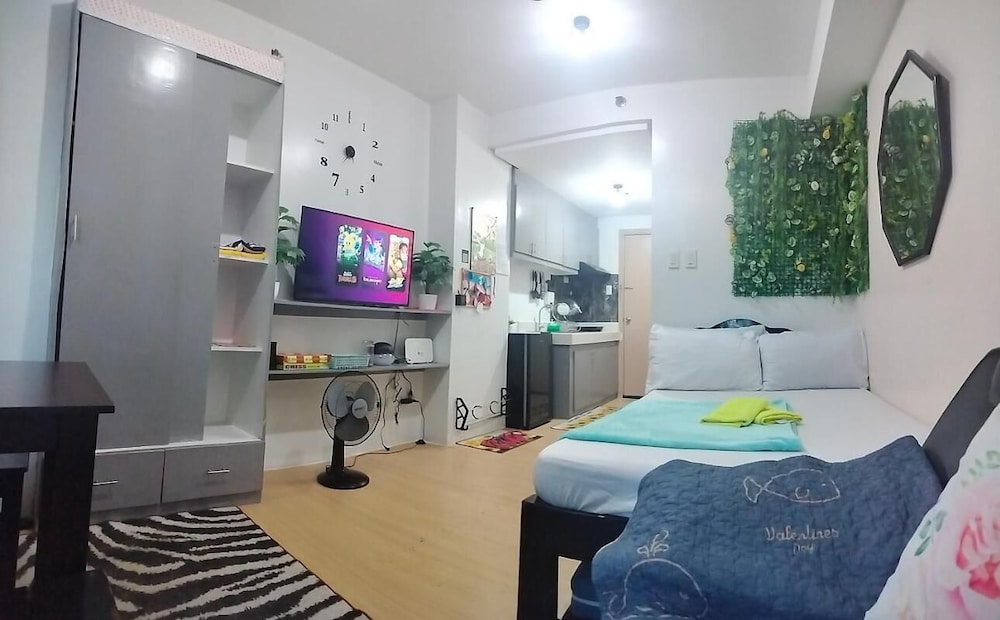 Cozy City View Condo in Quezon City - Your Home Away From Home