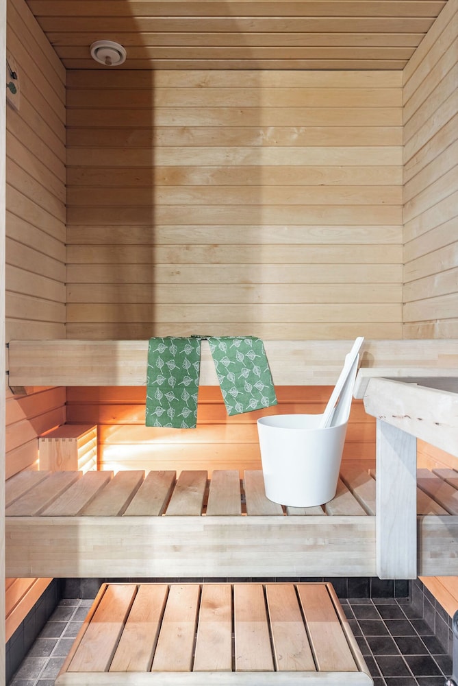 Modern 1BR Home with Sauna & Balcony