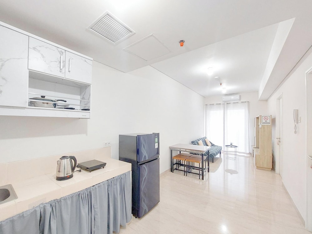 Homey And Compact 2Br Podomoro City Deli Medan Apartment