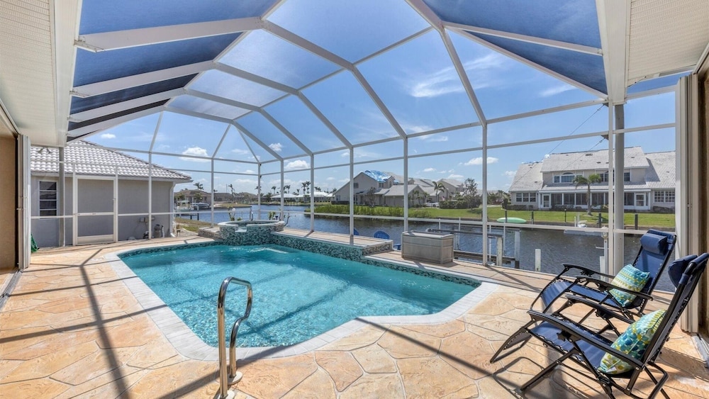 Waterfront Punta Gorda Isles 3 Bedroom pool hot tub, dock, bikes office 3 Home