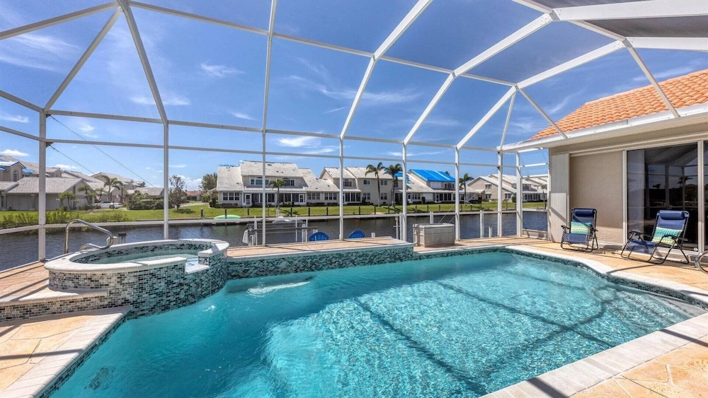 Waterfront Punta Gorda Isles 3 Bedroom pool hot tub, dock, bikes office 3 Home