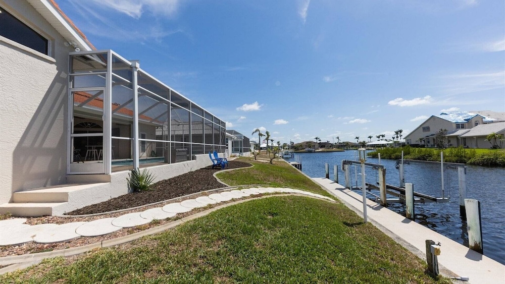 Waterfront Punta Gorda Isles 3 Bedroom pool hot tub, dock, bikes office 3 Home