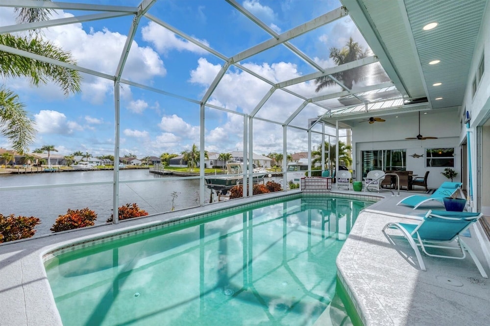 Punta Gorda Isles Private Pool Vacation Home - Waterfront Canal Views 4 Bedroom Home