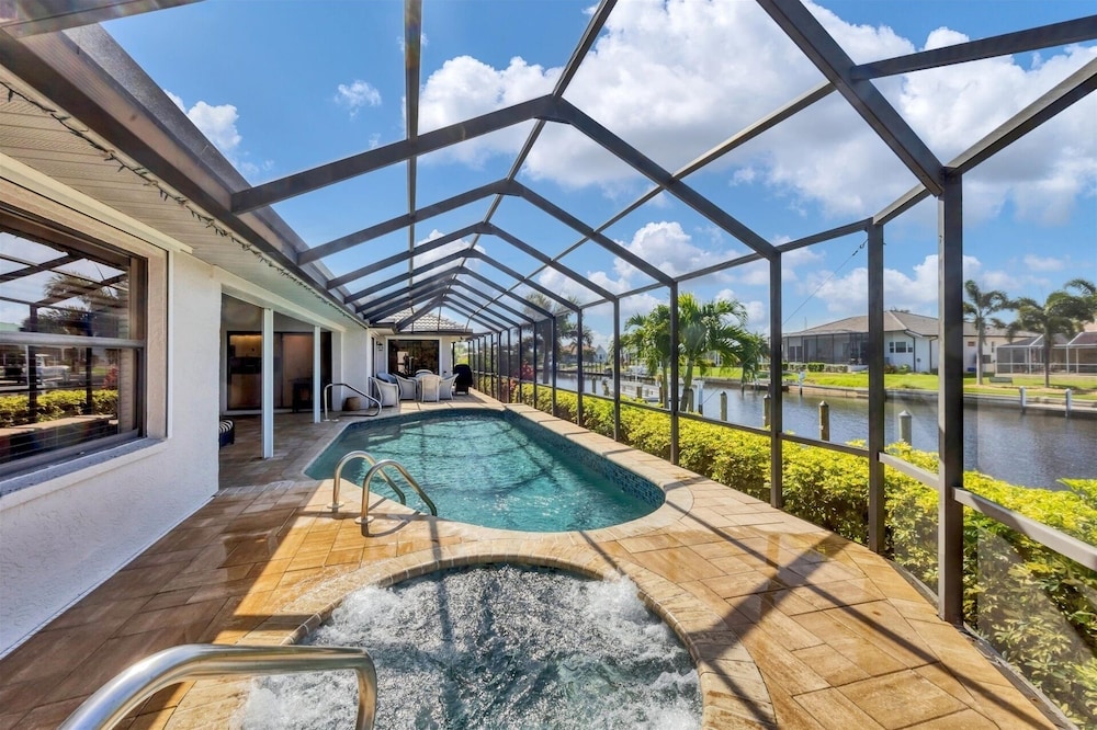 Punta Gorda Isles 3 Bedroom Private Pool+Spa Home on Canal 3 Home