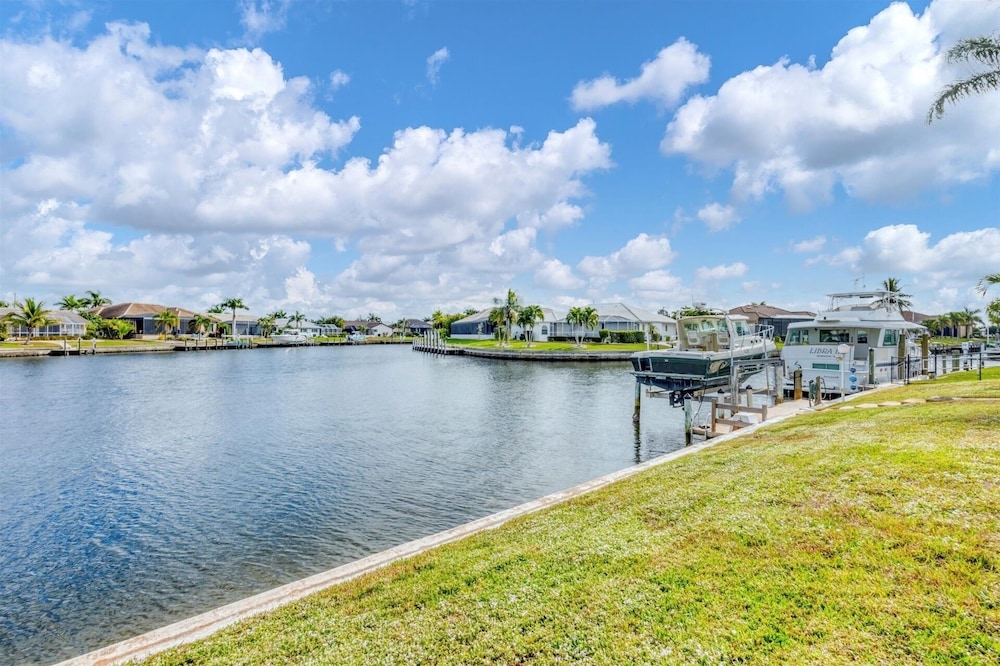 Punta Gorda Isles Private Pool Vacation Home - Waterfront Canal Views 4 Bedroom Home