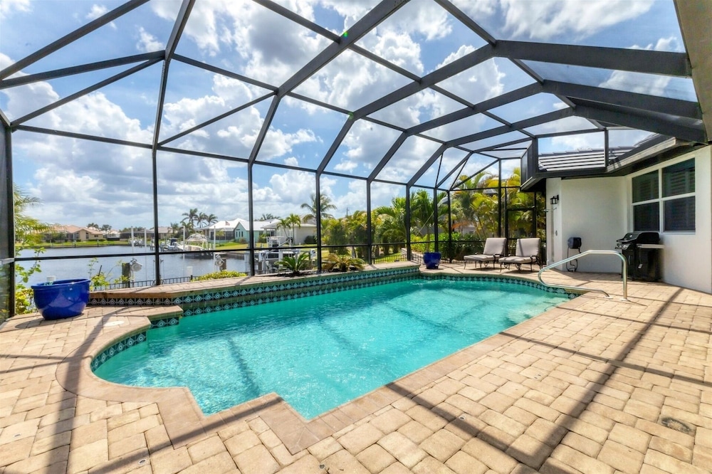 Punta Gorda Isles 4-Bedroom Private Pool Home on Canal 4 Home