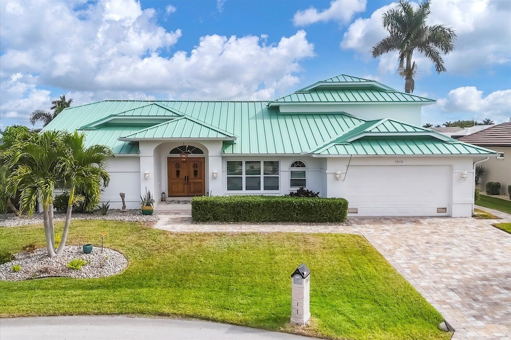 Punta Gorda Isles Private Pool Vacation Home - Waterfront Canal Views 4 Bedroom Home