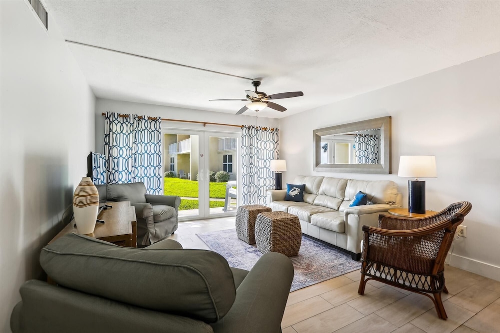 Beachfront Gem: Serene 2BD Haven With Pool & Views