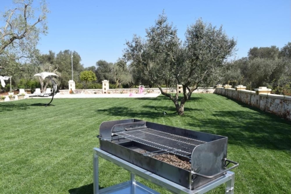 Fantastic Trulli Olea With Pool Garden view 4