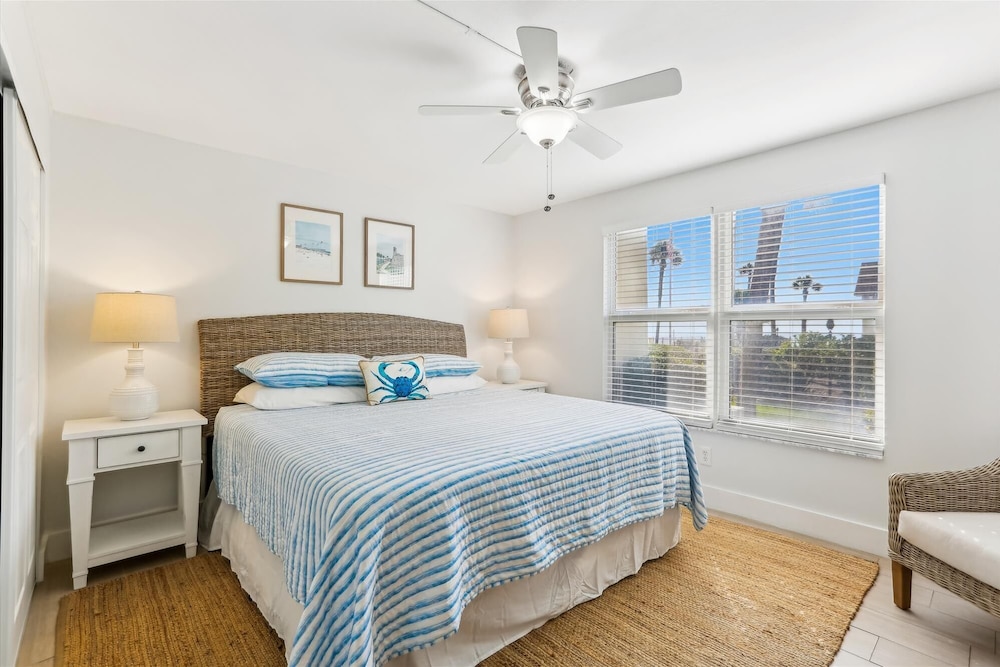 Beachfront Gem: Serene 2BD Haven With Pool & Views