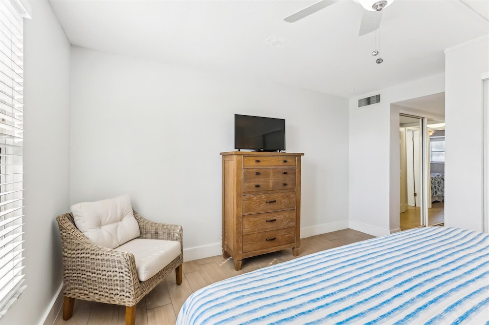 Beachfront Gem: Serene 2BD Haven With Pool & Views