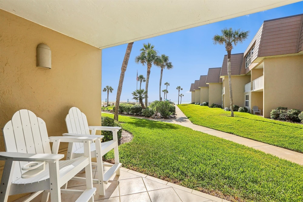 Beachfront Gem: Serene 2BD Haven With Pool & Views