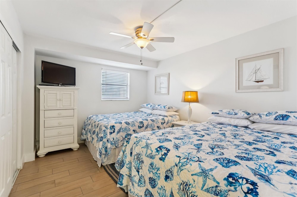 Beachfront Gem: Serene 2BD Haven With Pool & Views