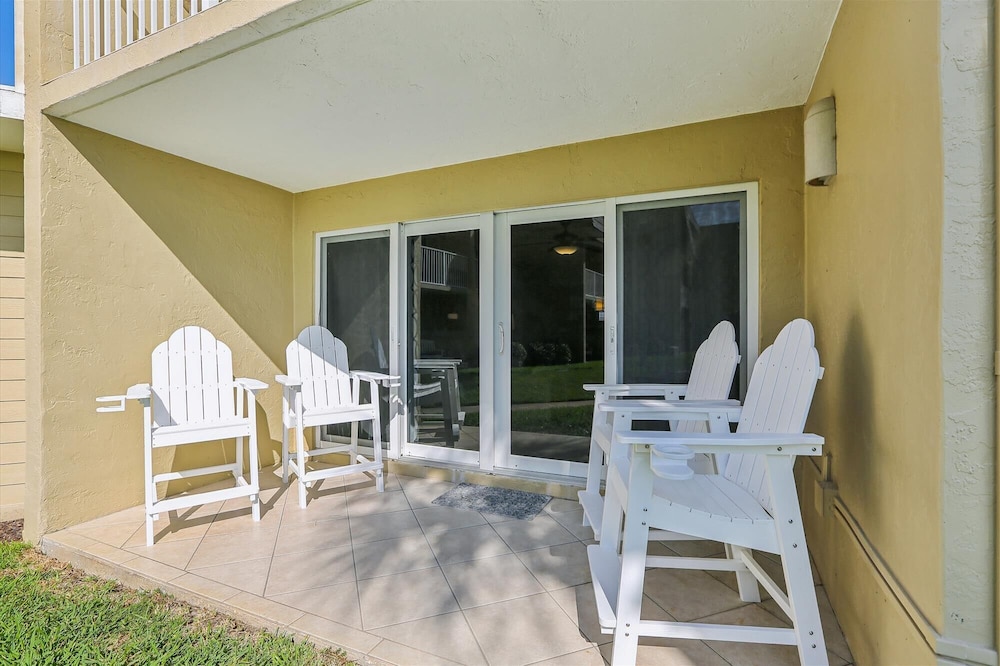 Beachfront Gem: Serene 2BD Haven With Pool & Views