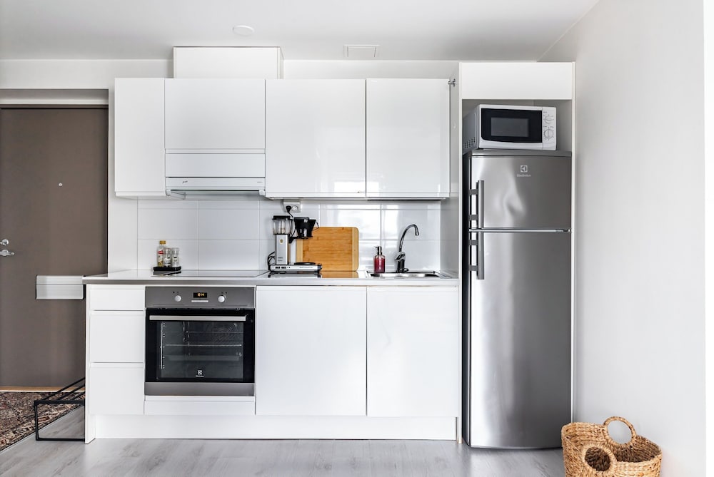 Modern 1BR Home with Sauna & Balcony
