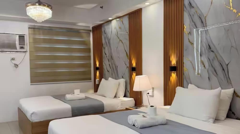 Relax in Pasay City's Best Kept Secret - Spacious Condo With Garden View