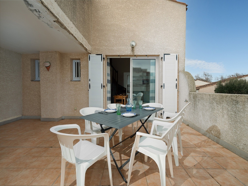 Sunny Terrace & Seaside Charm