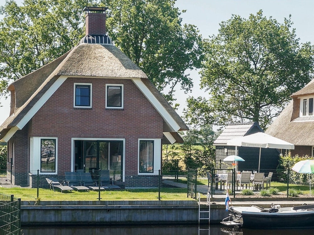 Villa in Friesland With Waterfront Garden view 3