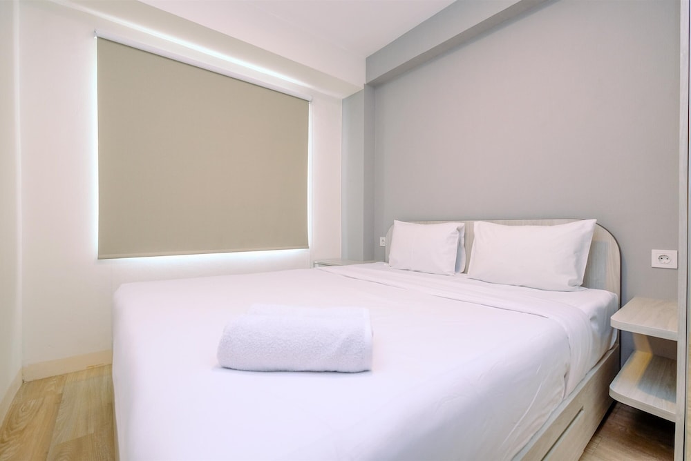 Minimalist and Warm 2BR at 29th Floor Podomoro Golf View Apartment