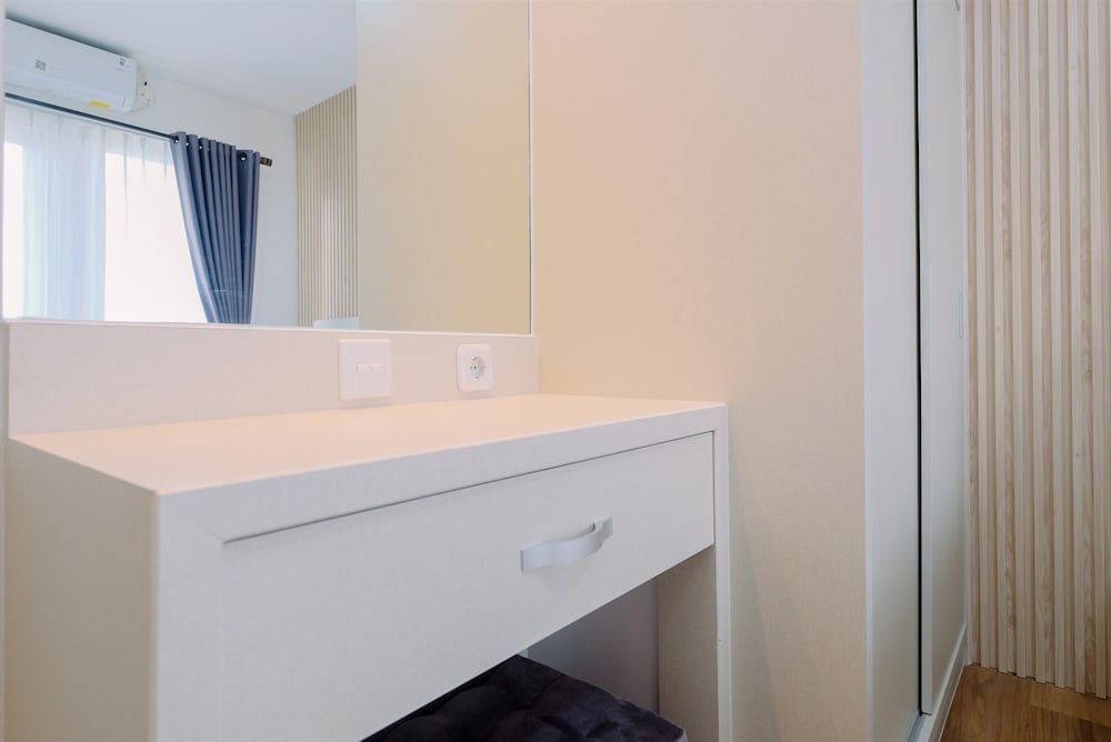 Restful and Modern 2BR at Sentul Tower Apartment