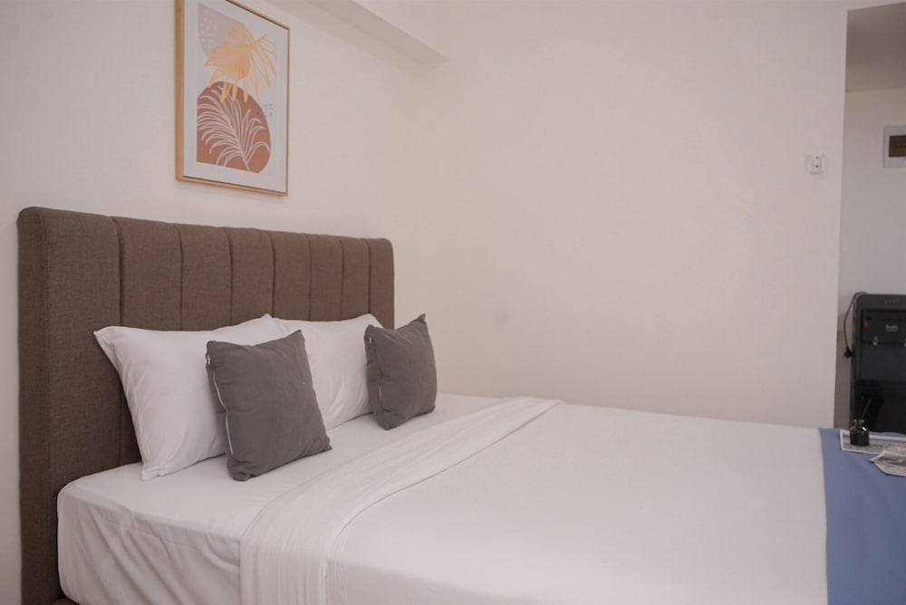 Minimalist And Warm Studio Room At Cisauk Point Apartment