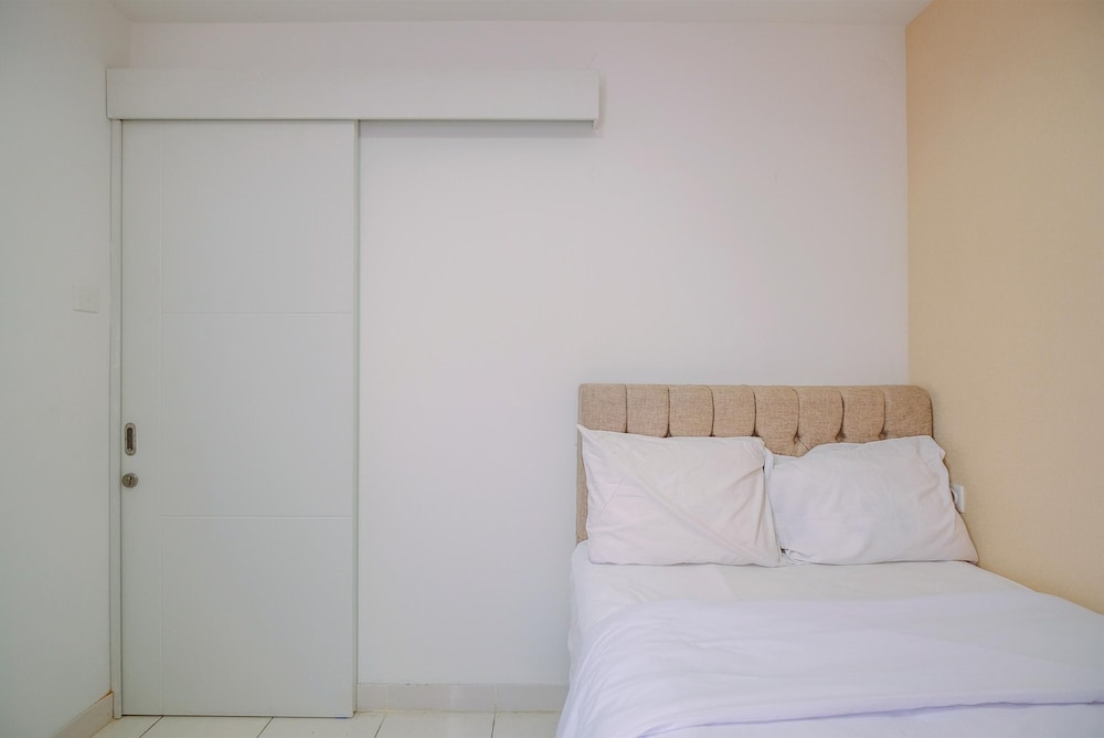 Comfort and Homey 2BR at Sentul Tower Apartment