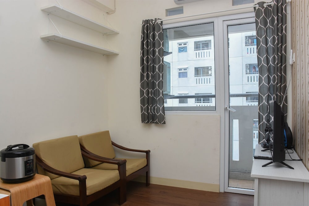 Fancy And Nice 2Br At Green Pramuka City Apartment view 2