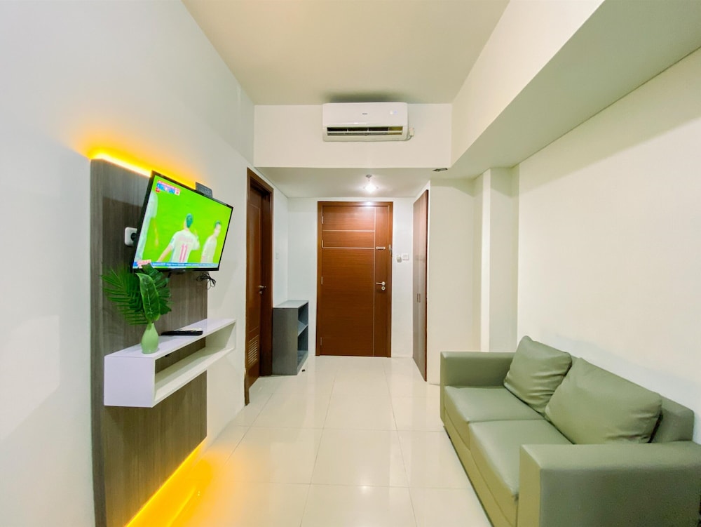 Spacious And Relaxing 2Br Apartment At Corner Vittoria Residence