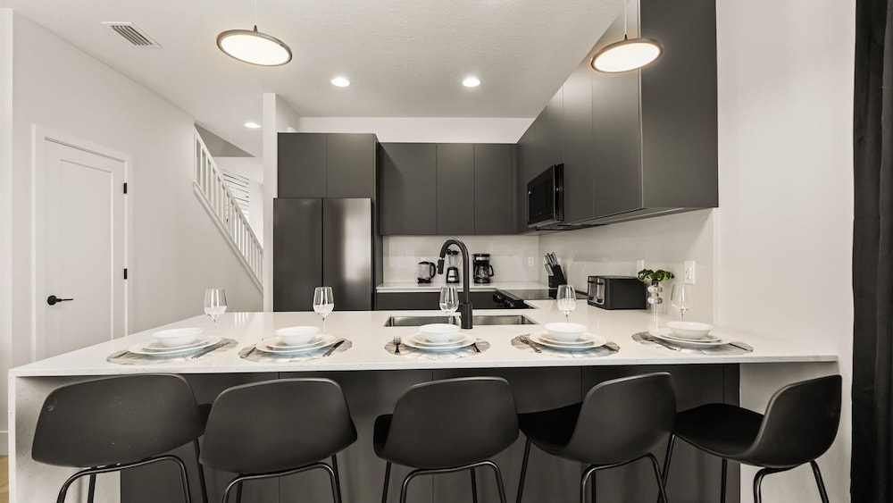 Contemporary 4BR Townhome With Pool Themed Rooms