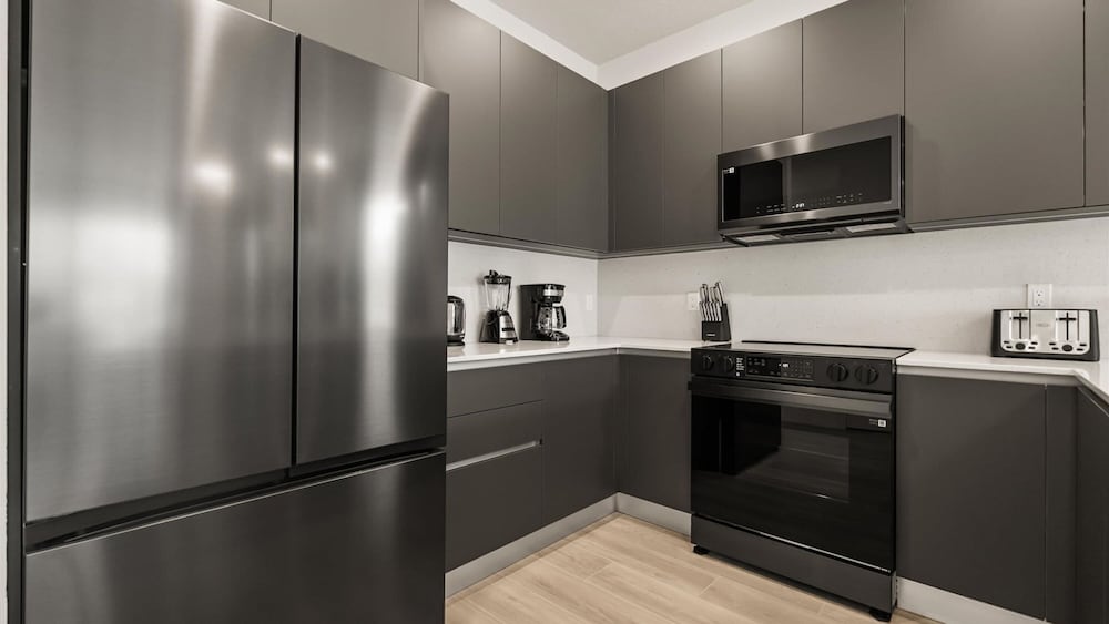 Contemporary 4BR Townhome With Pool Themed Rooms