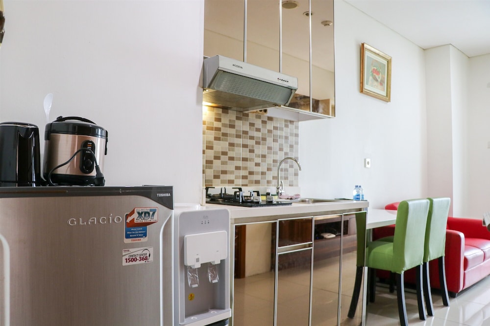 Great Location And Comfy 1Br Apartment Woodland Park Residence