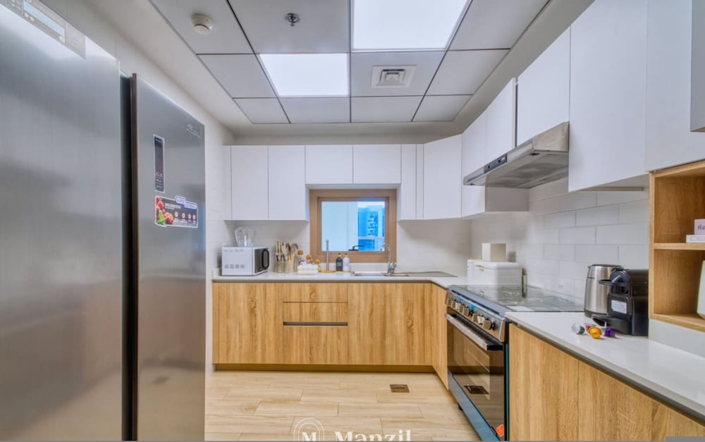 2BR Apt w Dubai Canal Views Near Burj Dubai Mall