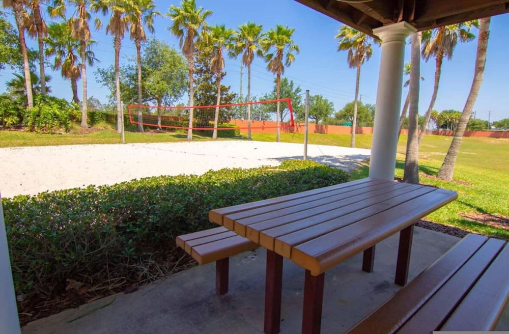 Home Comforts Near Disney Private Pool Backyard view 4