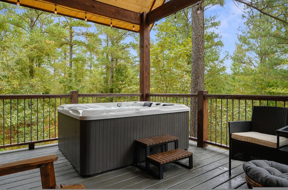 The Adirondack Hottub Shuffleboard Fireplace Foosball Table Arcade