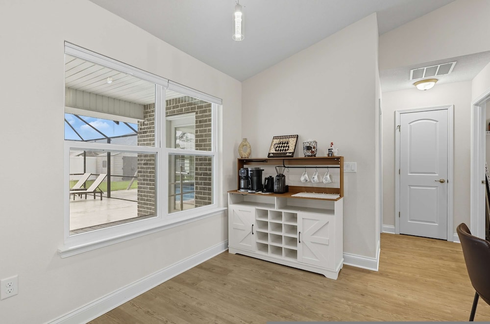 Modern 4BR Retreat Near Beach Heated Pool