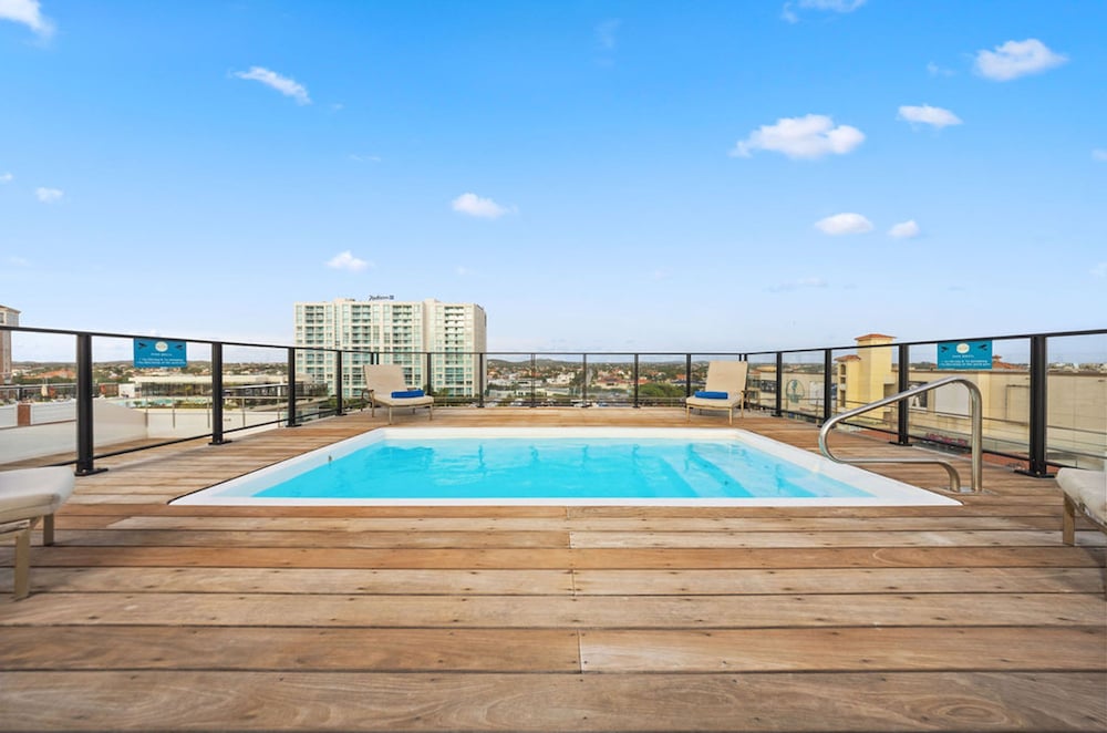 Modern Corner Unit Pool Steps From Palm Beach