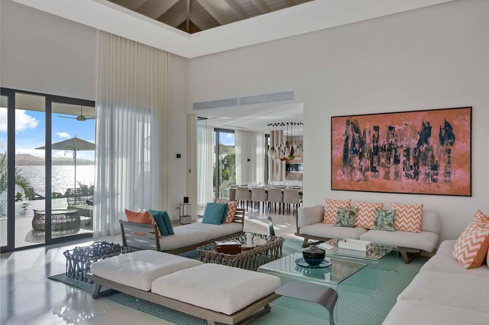 Gorgeous Beach House Perched Right Over the Ocean