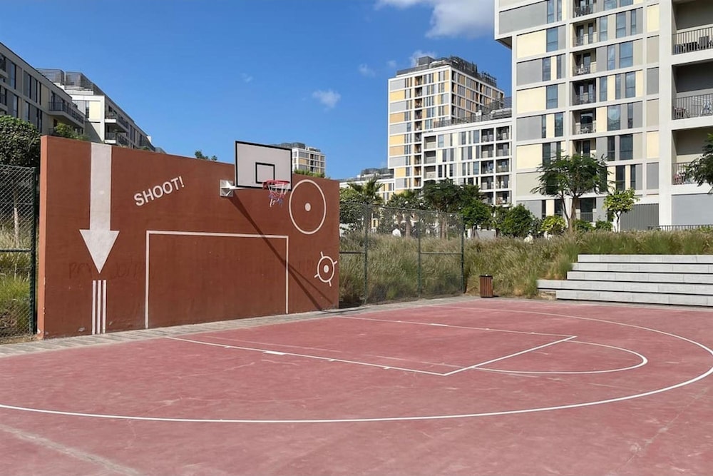 Elite LUX Holiday Homes - Modern 1BR Resort Amenities in Production City