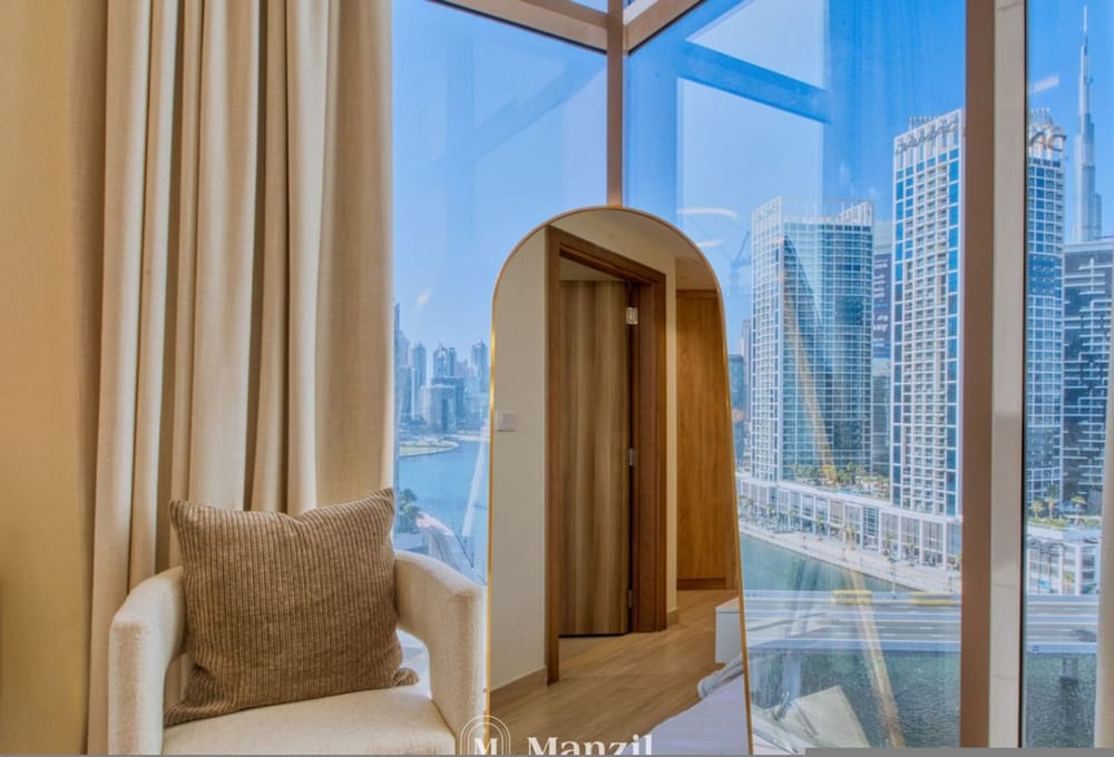 2BR Apt w Dubai Canal Views Near Burj Dubai Mall