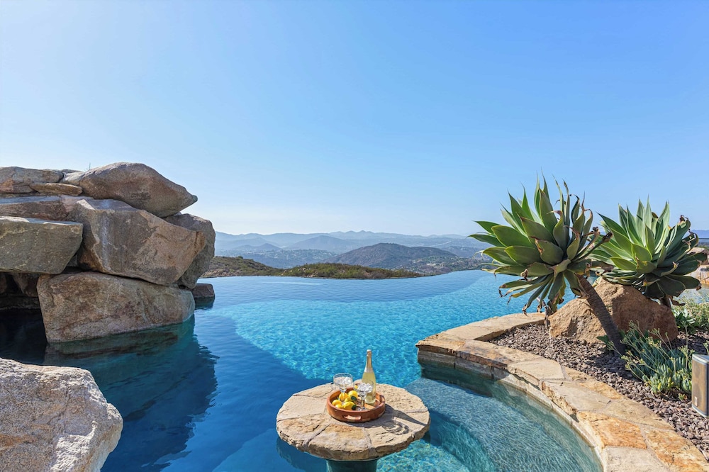Infinity Pool, Theater, Pickleball + 360 Views Near Lake Poway Sunset Point Estate by Avantstay