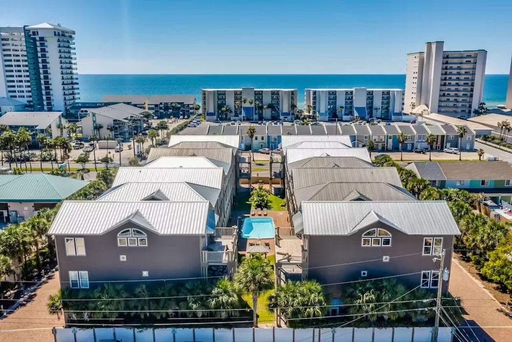 Serenity by the Sea! 4BR Retreat, Sleeps 12, Walk to Beach & Community Pool