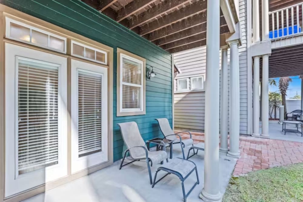 Serenity by the Sea! 4BR Retreat, Sleeps 12, Walk to Beach & Community Pool