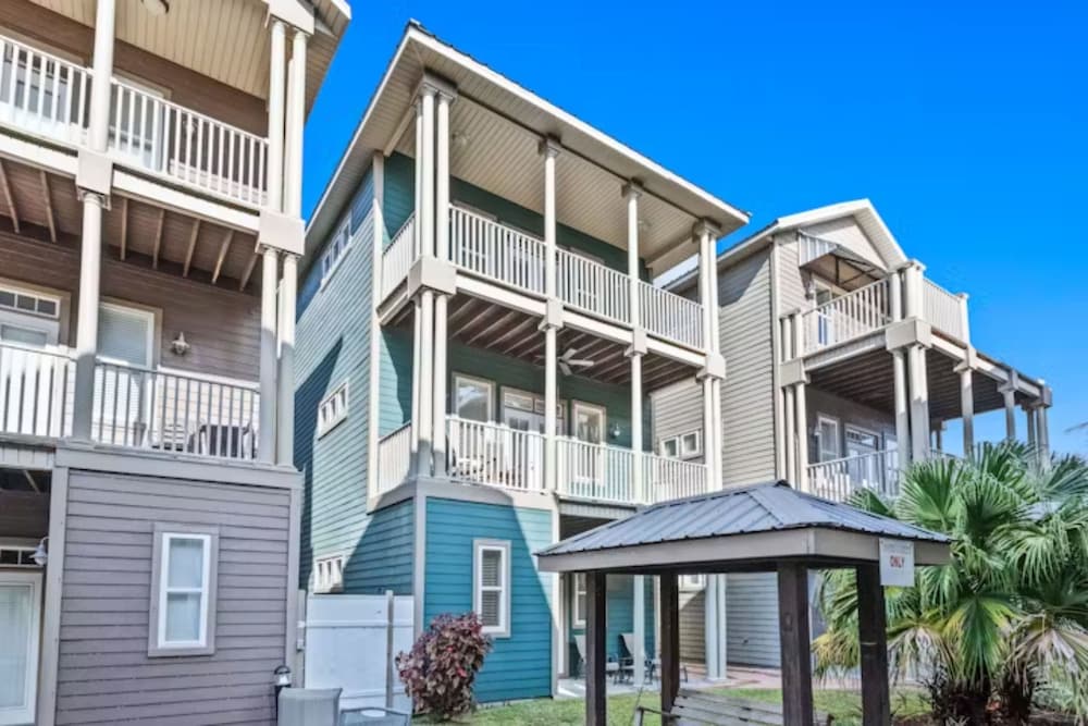 Serenity by the Sea! 4BR Retreat, Sleeps 12, Walk to Beach & Community Pool