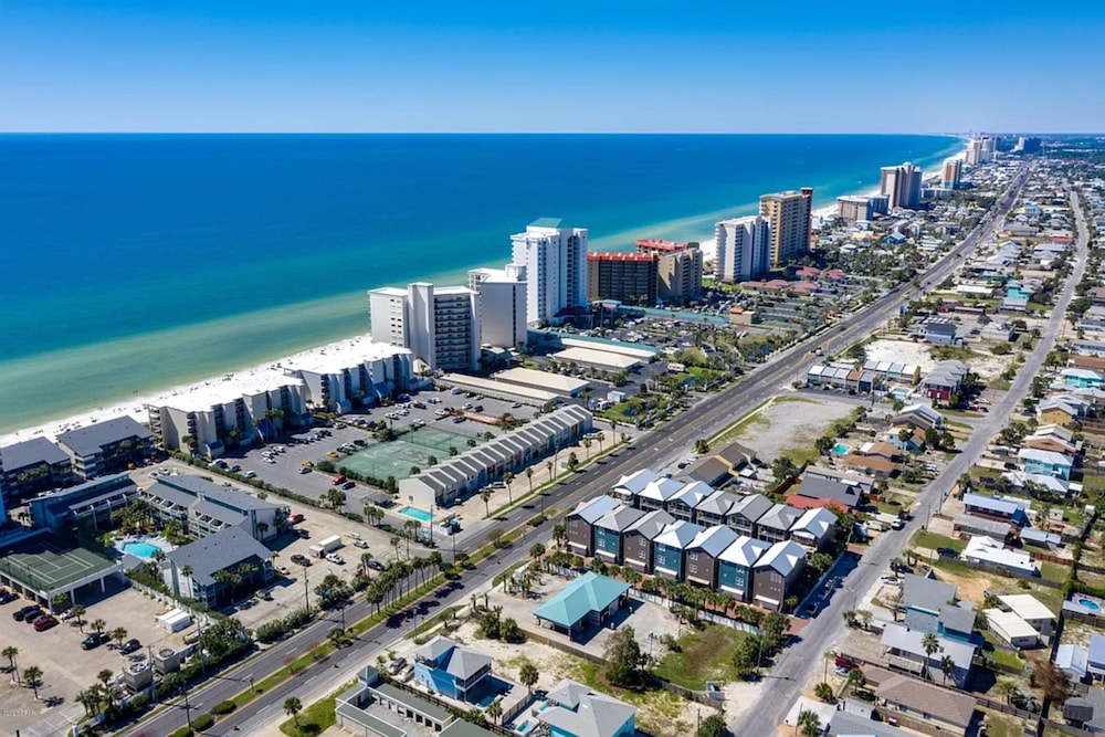 Serenity by the Sea! 4BR Retreat, Sleeps 12, Walk to Beach & Community Pool