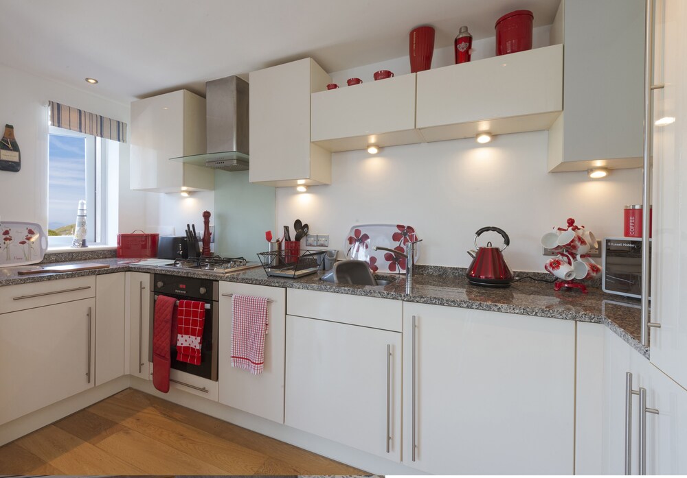 The Beach House & Porth Sands Apartments