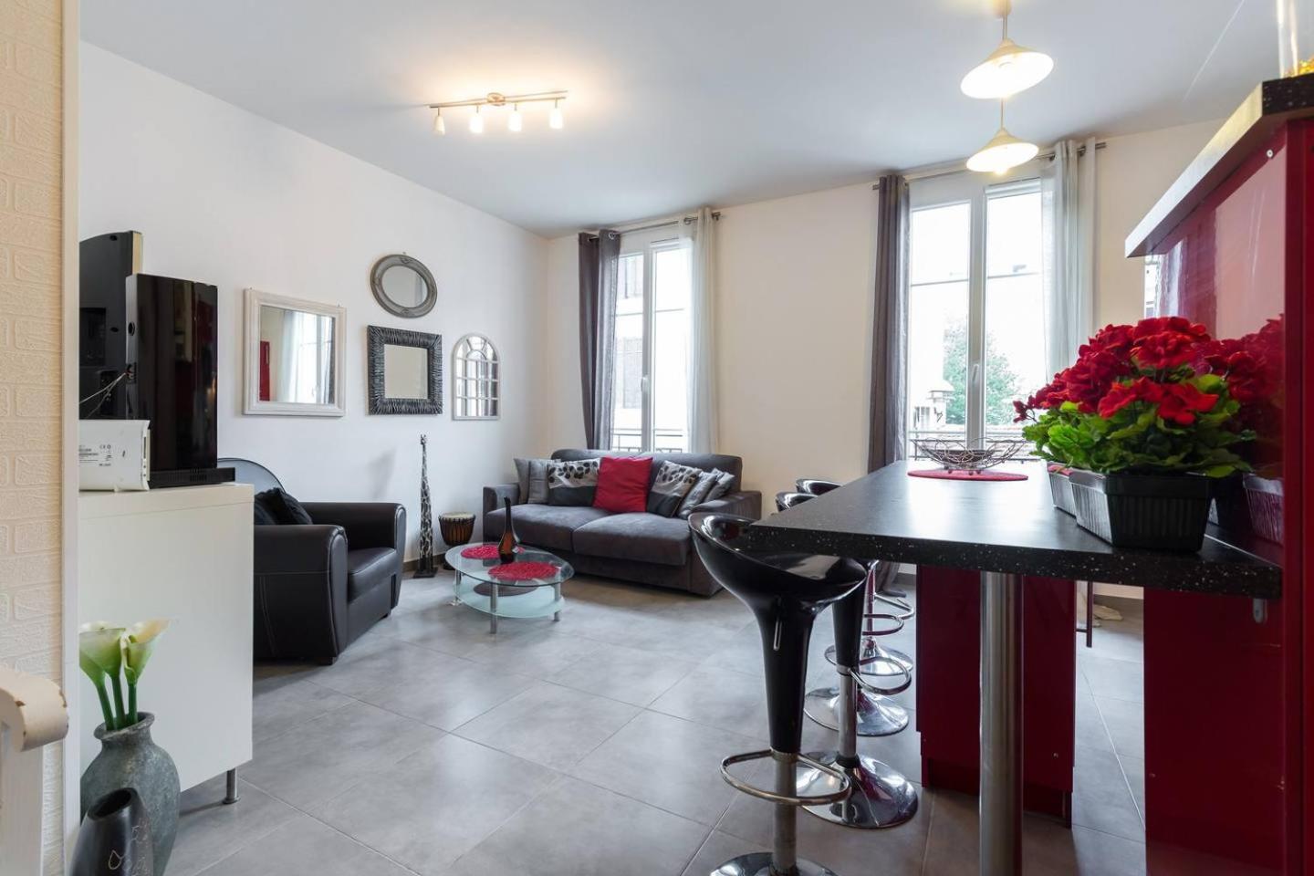 Stylish White and Red Apartments view 3